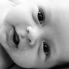 Black and white picture of a toddler baby boy